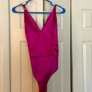 Pink bodysuit with lace up back